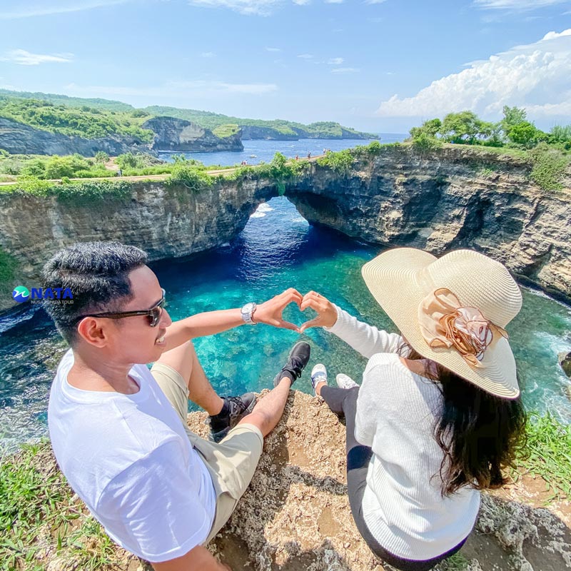 Tourists Enjoy Vacationing at Pasih Uug Beach